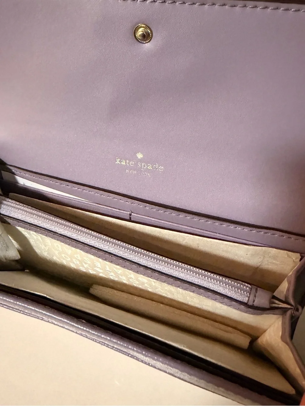 kate spade lilac pebbled leather continental wallet